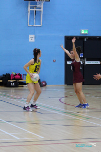Two ladies playing Netball in the BUCS Conference Finals