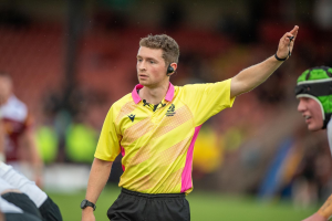 Ruairidh Campbell refereeing a rugby match
